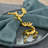 Gold Reindeer Napkin Ring Set of 4 in Graceful Leaping Pose for Elegant Dining Table Decor