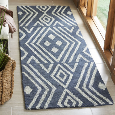 Vedika Hand Tufted Wool/Cotton Geometric Rug in Navy/Blue