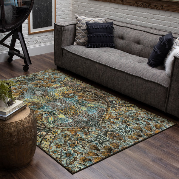 https://assets.wfcdn.com/im/91579201/resize-h600-w600%5Ecompr-r85/2446/244636470/Bradyn+Machine+Tufted+Performance+Rug.jpg