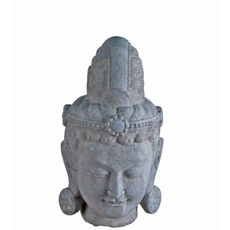 A Stone Statue Of Guanyin Head