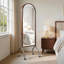 Miroir arqué pleine longueur avec tablettes et roulettes de rangement, miroir roulant autoportant pour la chambre à coucher et le salon