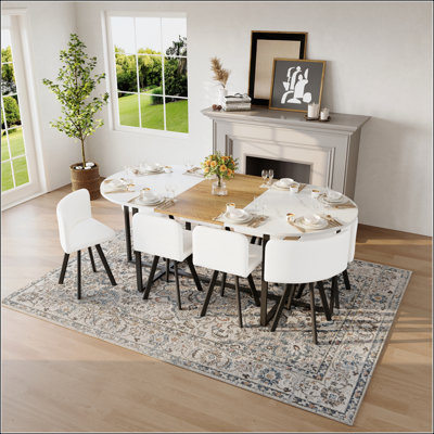 Ensemble de table de salle à manger 9 pièces ovale avec plateau en faux marbre blanc et triamine de grain de bois et 8 chaises en similicuir blanc