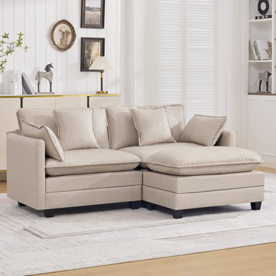 Canapé modulaire rembourré en similicuir avec repose-pieds