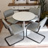 Ensemble de table de salle à manger pour 4 personnes - table Tuilp avec 4 chaises de salle à manger rembourrées (structure tubulaire grise)