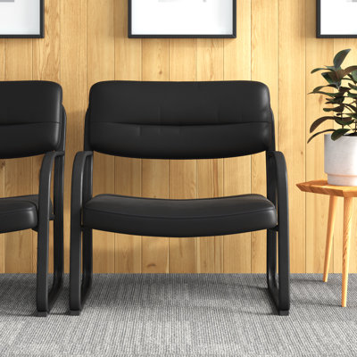 Large leather guest armchair Nivaeh Crusoe