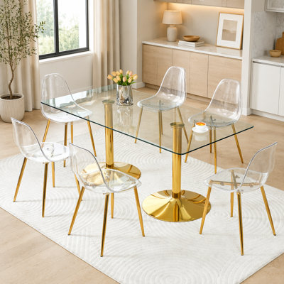 Table de salle à manger moderne en verre trempé avec 6 chaises transparentes, pieds en métal doré, conception compacte pour une salle à manger élégante