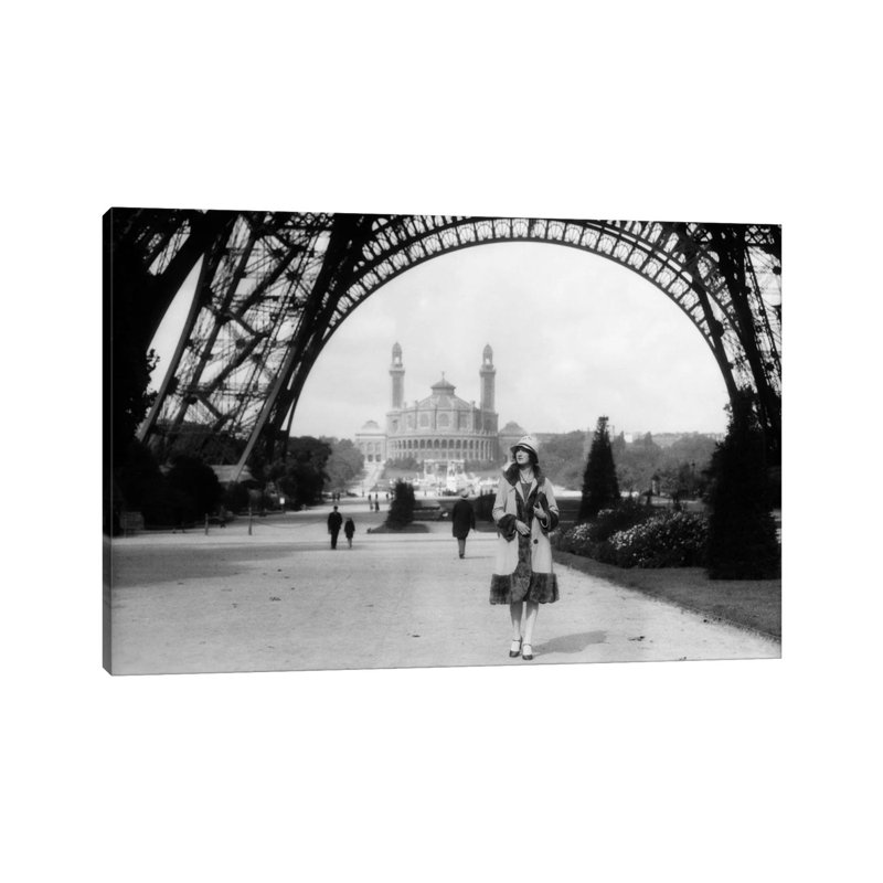 1920s Woman Walking Under The Eiffel Tower With The Trocadero In Background Paris France by Vintage Images - Wrapped Canvas Print