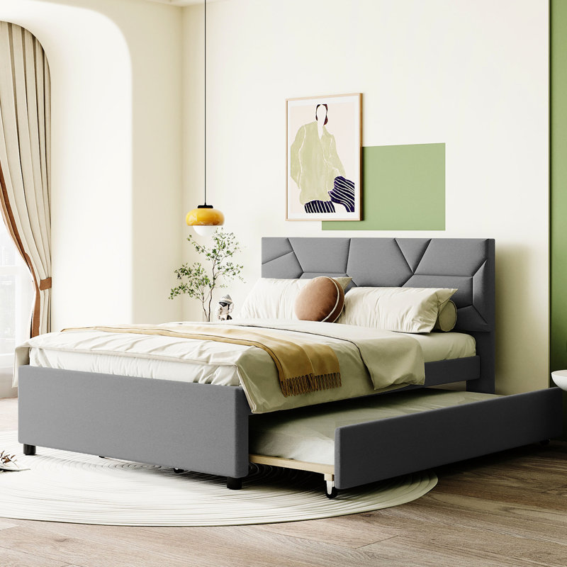 Lit plateforme tapissier avec tête de lit à motif brique et lit gigogne simple en lin gris pour une chambre à coucher relaxante