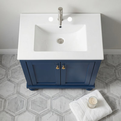 Meuble-lavabo minimaliste 24 po avec pieds sculptés et tablette réglable - Armoire de rangement à fermeture en douceur avec lavabo en céramique pour les petites salles de bain ou les salles d'eau