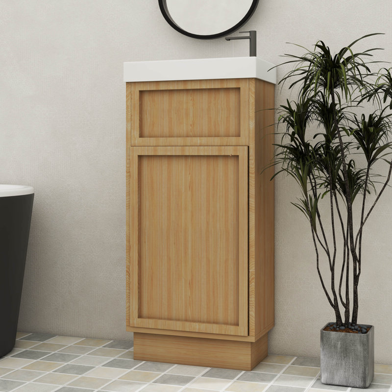Meuble-lavabo compact de 15,75 pouces avec une armoire réversible en résine, une tablette réglable et une porte à ouverture par pression