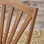 Chaise d'extérieur en bois massif à bascule Cathleen-31980702