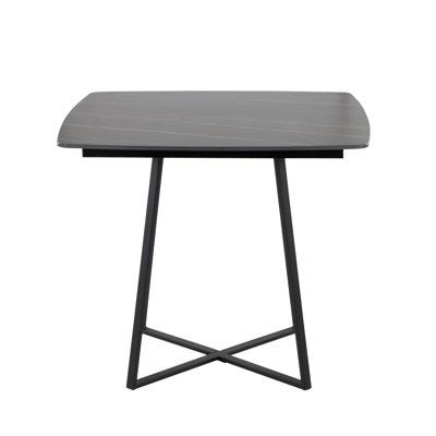 Table de salle à manger avec base en métal et plateau en céramique effet marbre