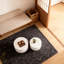 Table basse ronde blanche avec rangement caché