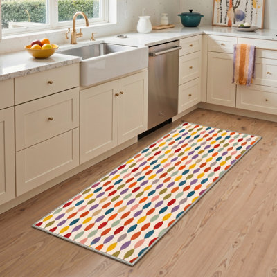 Tapis rond géométrique blanc / orange lavable à la machine avec envers antidérapant