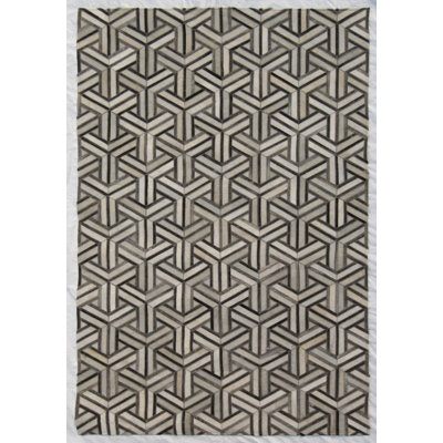 Tapis géométrique en cuir de vache fabriqué à la main en noir / gris