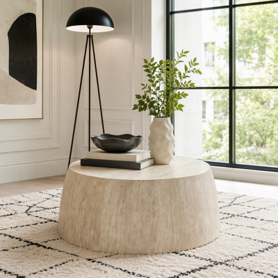 Table basse ronde à deux niveaux avec finition