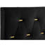 Lit à panneaux King, revêtement noir, tête de lit rembourrée, boutons en forme de losange avec barrettes dorées, cadre ouvert pour optimiser l'espace de la chambre
