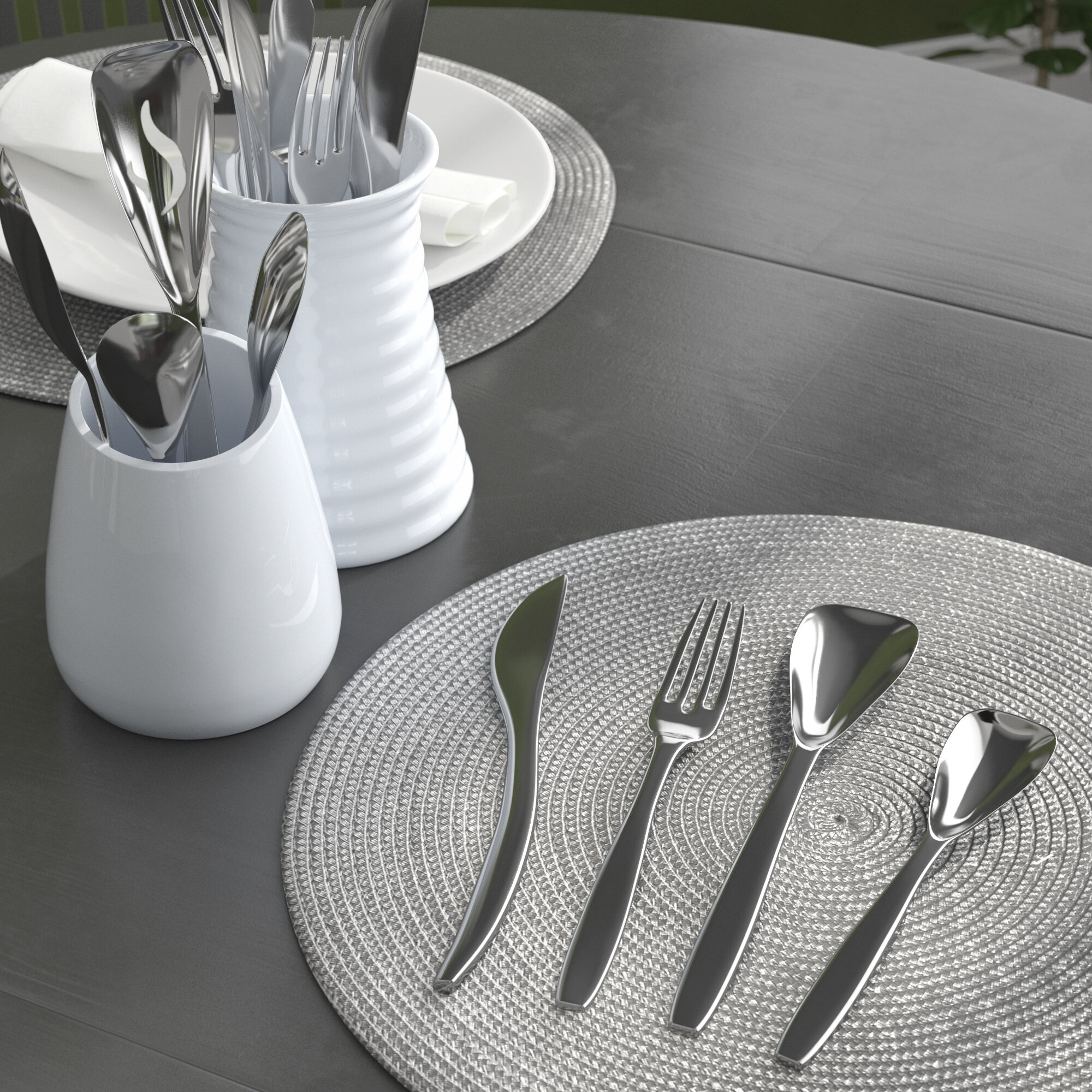 https://assets.wfcdn.com/im/91712881/compr-r85/1218/121895751/ebern-designs-judique-stainless-steel-flatware-set-service-for-8.jpg