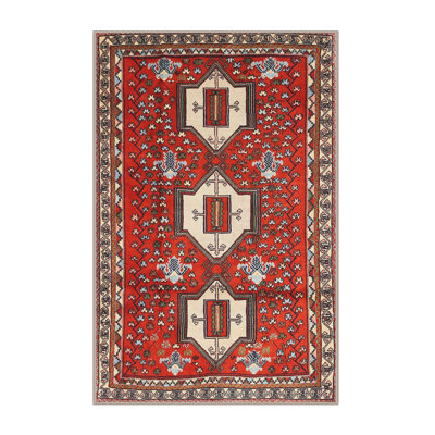 Tapis rouge à motif sud-ouest