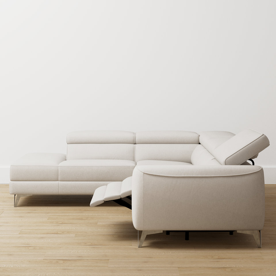 Off-white sectional with extended recliner footrest.