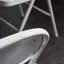 Chaises en fer blanches pliantes élégantes - Sièges de coussin en PVC rembourrés d'éponge pour la maison et les événements