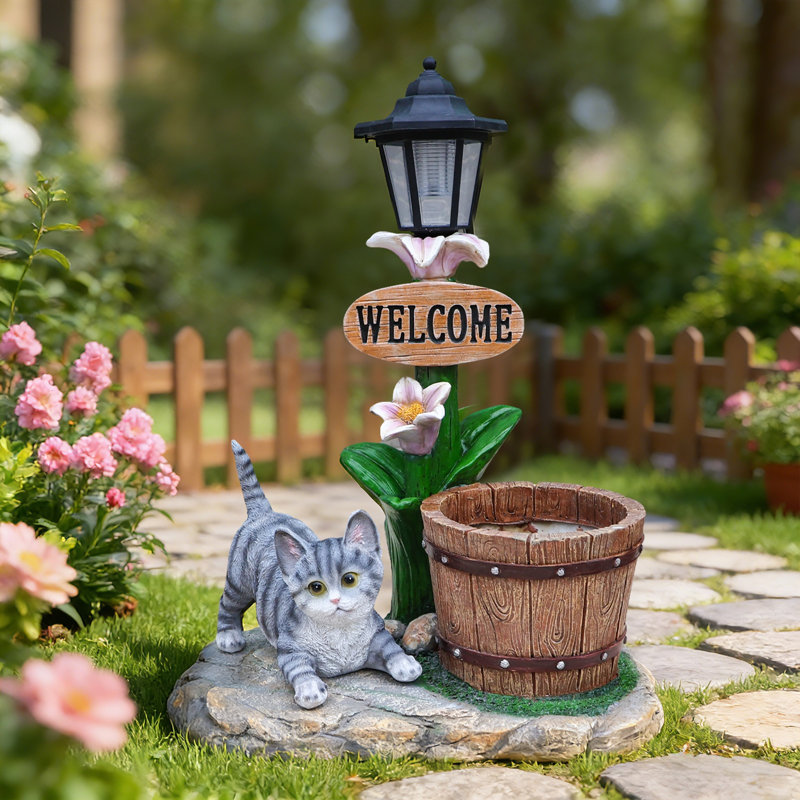 Décoration de jardin jardinière chat allongé