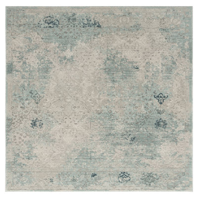Tedesco Abstract Area Rug in Ivory/Blue
