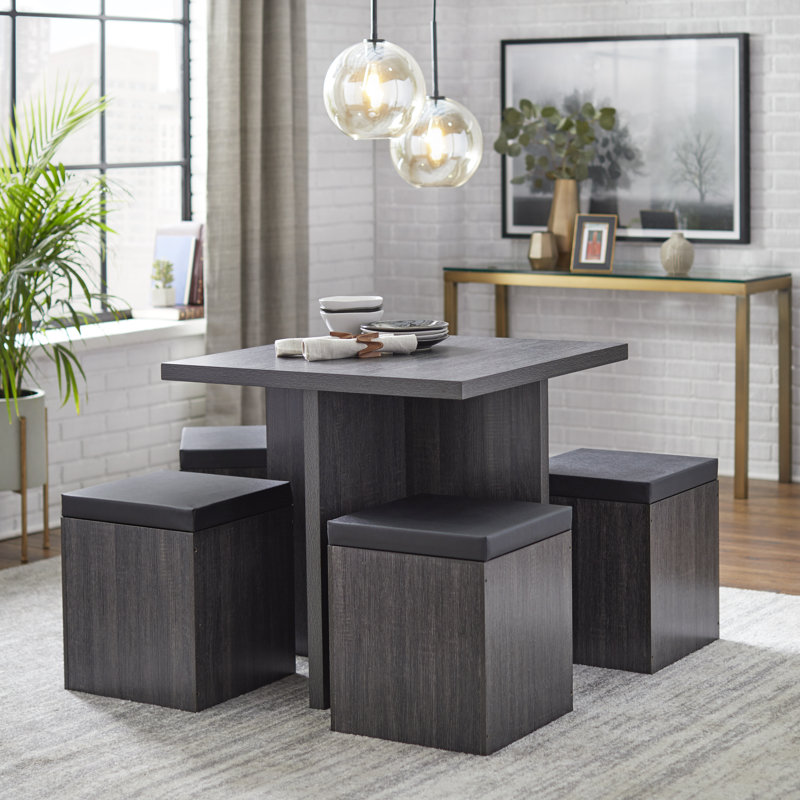 Ensemble de salle à manger à tréteaux pour 4 personnes avec tabourets de rangement Badillo, Gris foncé