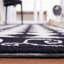 Tapis géométrique en laine crocheté à la main Brayton-486985165