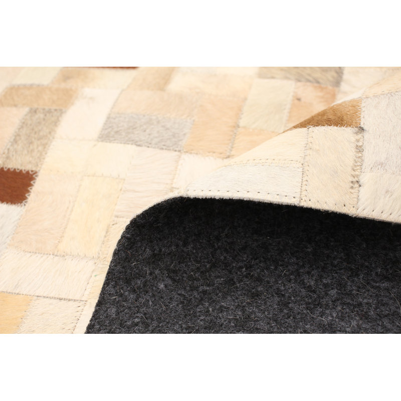 Jaythian Cowhide Patchwork Indoor Rug