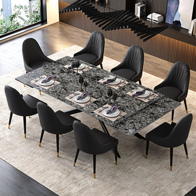 Ensemble 9 pièces de table de salle à manger rectangulaire extensible en fritté de 110,23 po avec 8 chaises en cuir