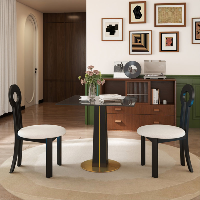 Table de ronde ronde moderne - plateau en verre trempé noir de 85 cm, pieds en bois noir avec base en métal doré