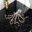 Louvenia Antiqued Silver Resin Octopus Tabletop Sculpture-95261428
