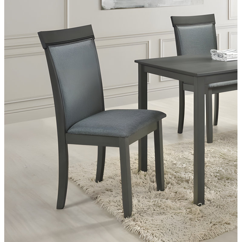 Chaise de salle à manger rembourrée en polyester Roxa