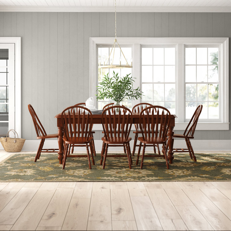 Azizi 8 - Person Extendable Solid Wood Top Four Leg Dining Set