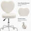 Ce fauteuil de coiffeuse à dossier en forme de cœur dispose d'un réglage en hauteur et en hauteur, d'une rotation à 360 degrés, de roulettes et d'une chaise de bureau.