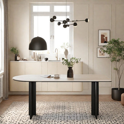 Small black rectangular rock slab dining table