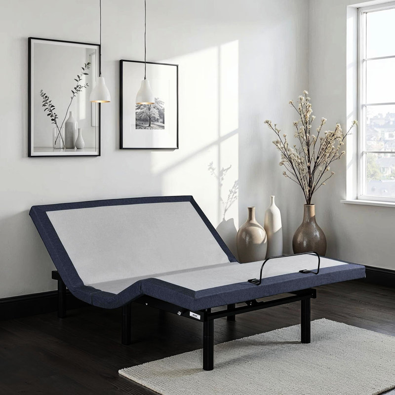 Base de lit simple TG ajustable avec retour par simple pression, changements de position de la tête et des pieds, trois modes de vibration, positions préréglées Tv / Zero Gravity / Lounge, 2 ports de charge, éclairage sous DEL, pliage central,