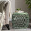 Charmante table d'appoint en fer avec un design polyvalent pour n'importe quelle pièce