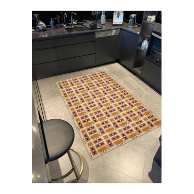 Tapis jaune tissé à motif géométrique rectangulaire