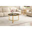 Ensemble de deux tables basses gigognes rondes au style glamour moderne, avec structure en métal doré et plateaux en verre noir.-1282441092-1282441094
