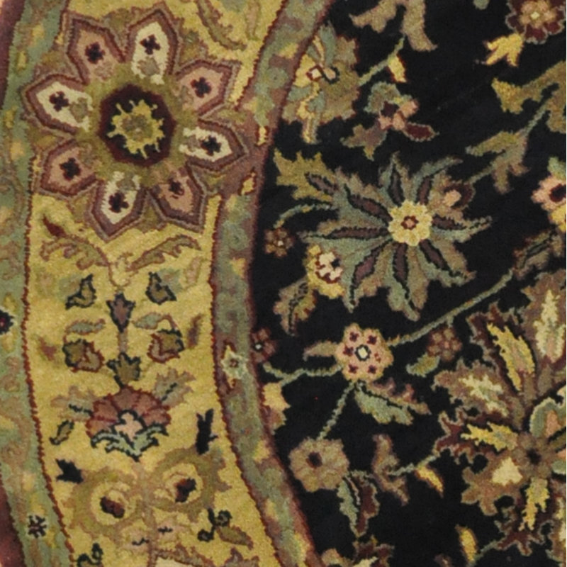 Tapis floral en laine noué à la main noir / or Alcie