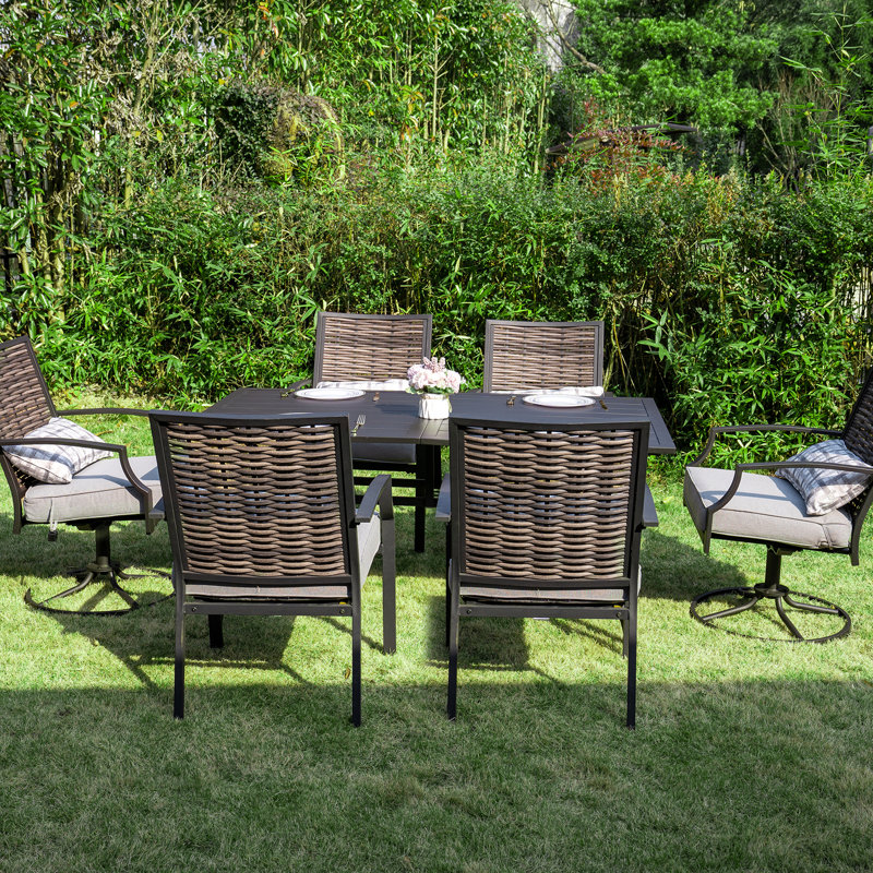 Ensemble repas 7 pièces d'extérieur en acier avec chaises pivotantes et stationnaires - dossier en osier de qualité supérieure et coussins résistants aux intempéries