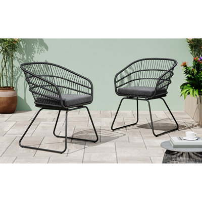Outdoor Chairs In Gray, 2Pcs With Cushions. Graceful Tub Design And Wrap Finish. Stable Splayed Sled Legs. Water- Seat 23.45" W X 24.15" D 32.25" H. 300 Lbs Capacity Chair Cushions For Enjoyment.