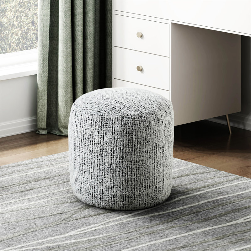 Repose-pieds cylindrique rembourré en tissu de chenille