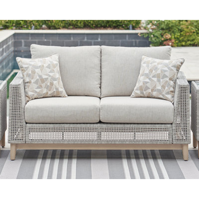 Causeuse d'extérieur avec coussin Breshae