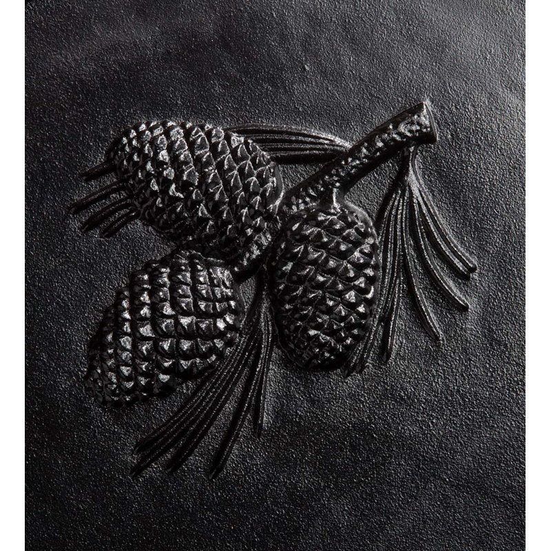 Plaque de cheminée en fonte avec motif pomme de pin