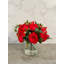 Arrangement de pivoines rouges en soie dans un vase en verre