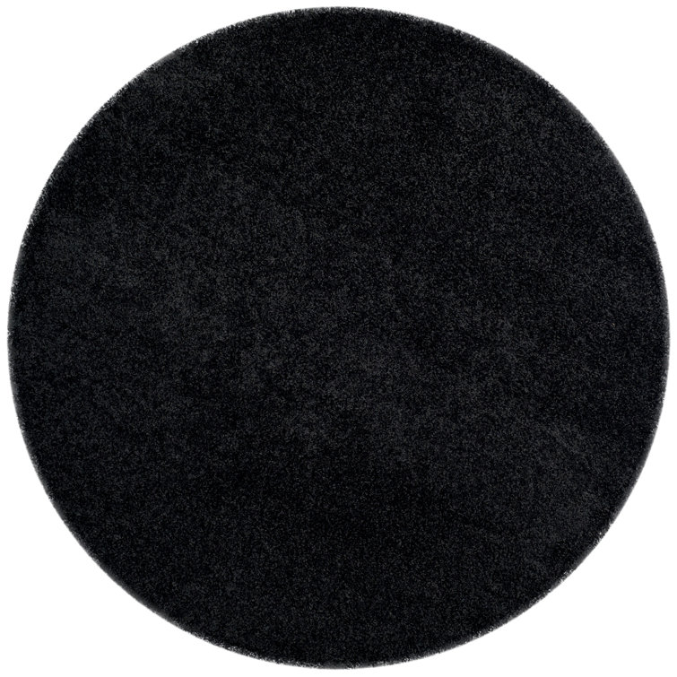 Tapis noir Demi-Leigh