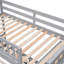 Lit superposé gris en bois gris avec six tiroirs, des tablettes modifiables et un lit simple double avec tiroir réglable